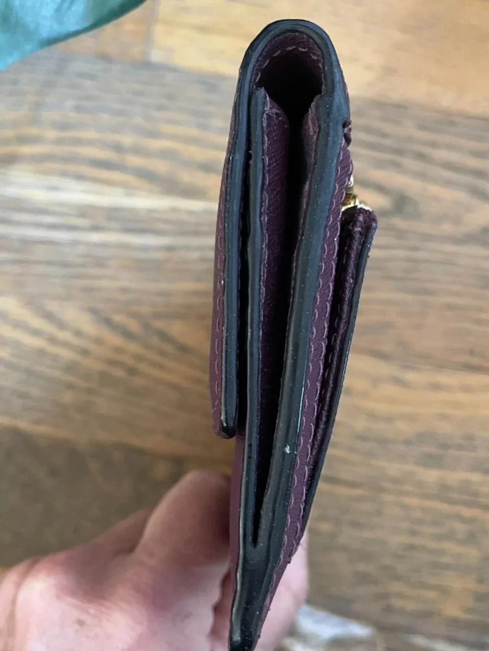 Kate Spade Large bi- Fold wallet in Deep Plum